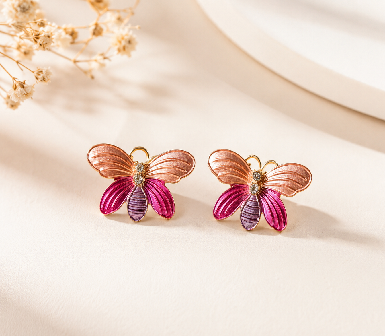Pink butterfly studs