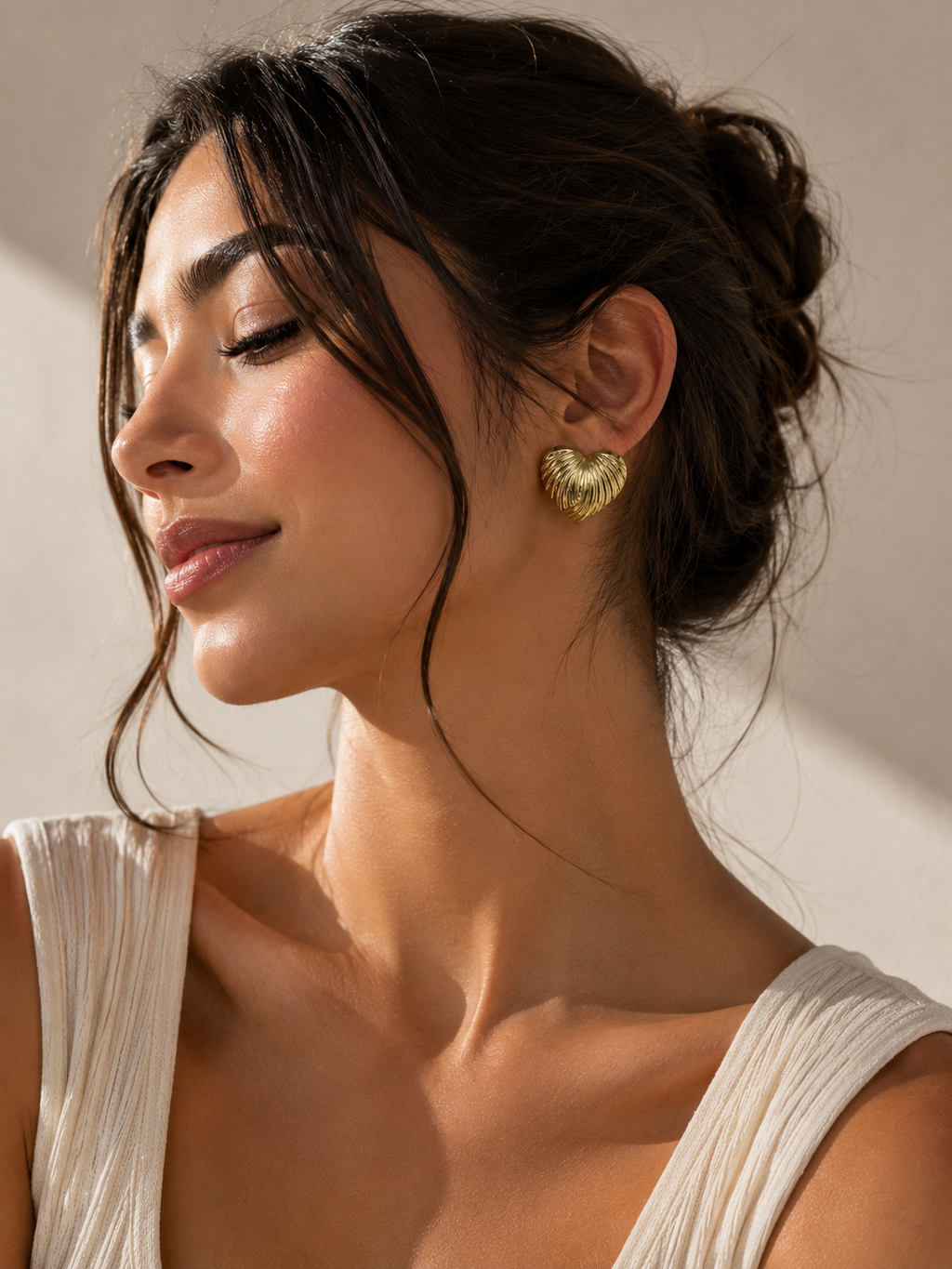 Golden striped hearts studs