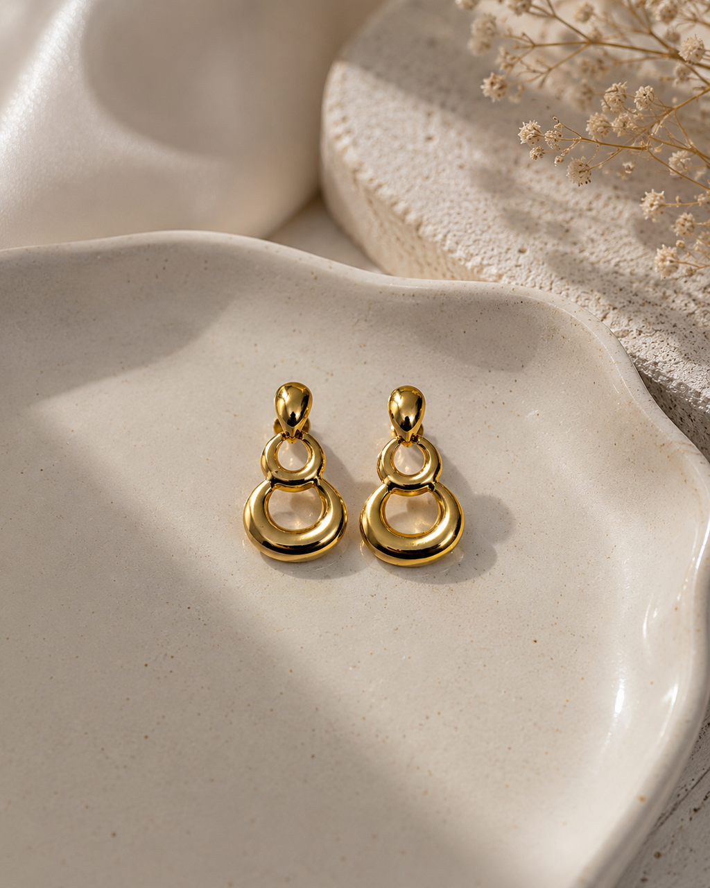 Three drop earrings