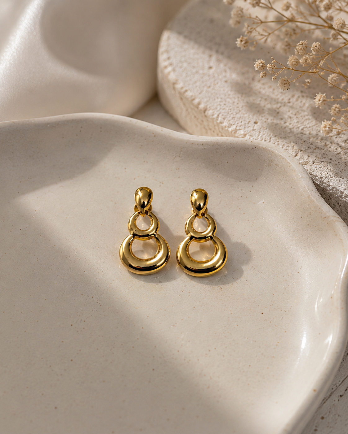 Three drop earrings